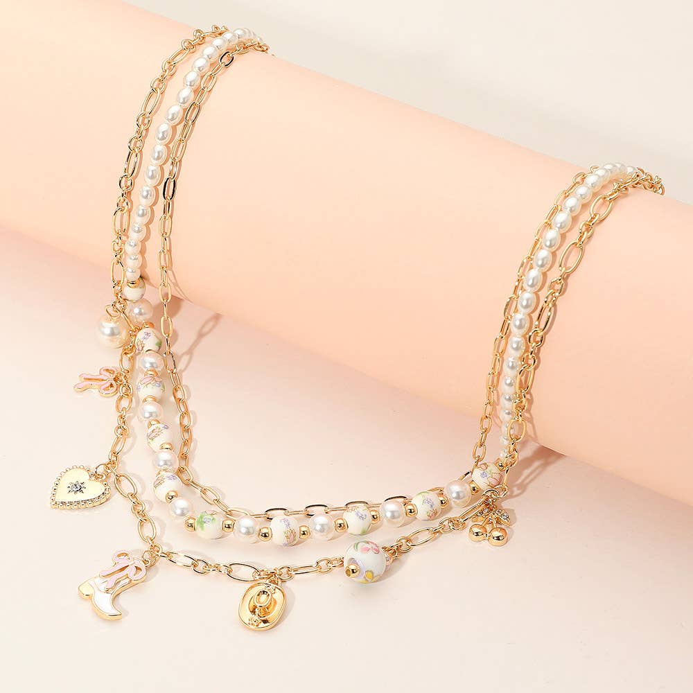 Western Cowboy Boot Hat Bow Cherry Heart Charm Station Pearl Floral Ceramic Ball Beaded Layered Necklace: Gold,Pink