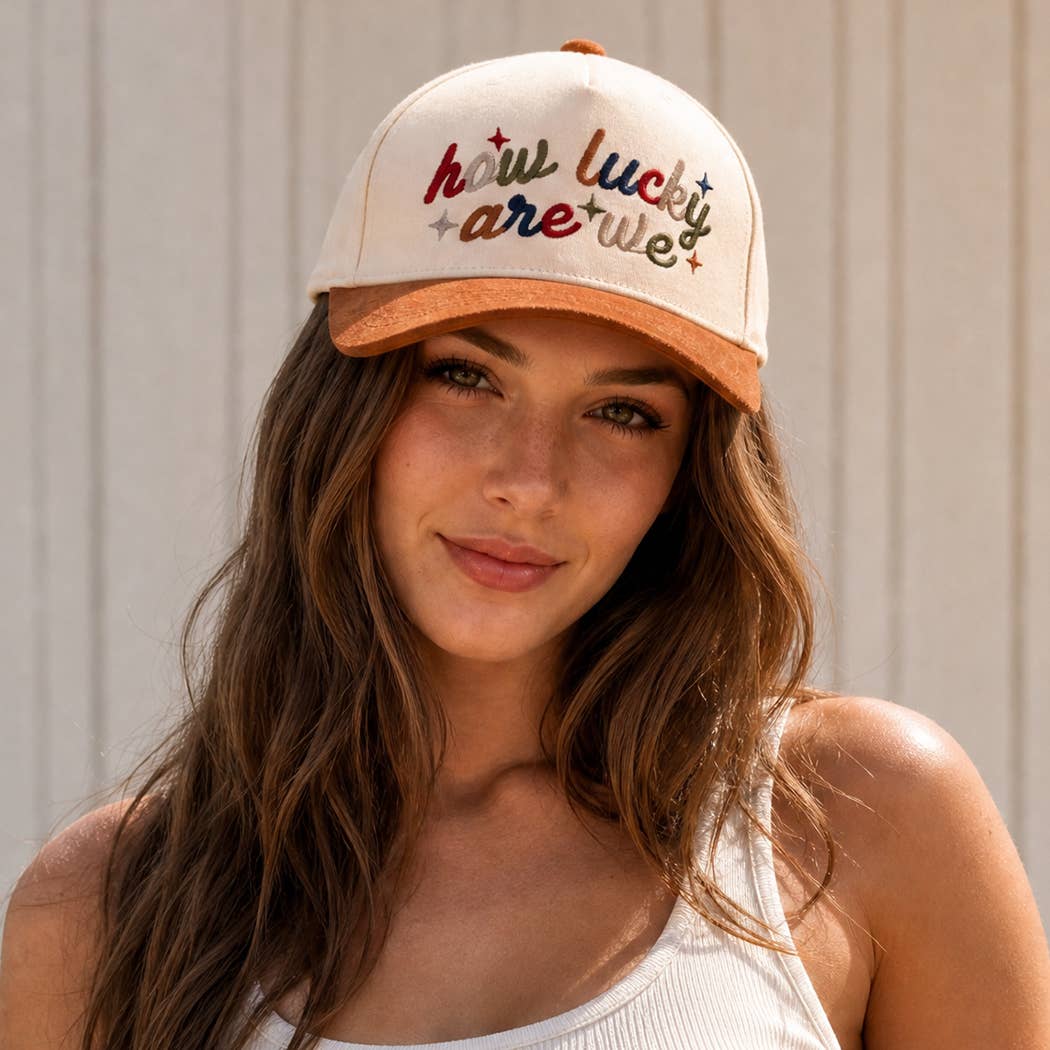 HOW LUCKY ARE WE Two-Tone Suede Brim Trucker Hat