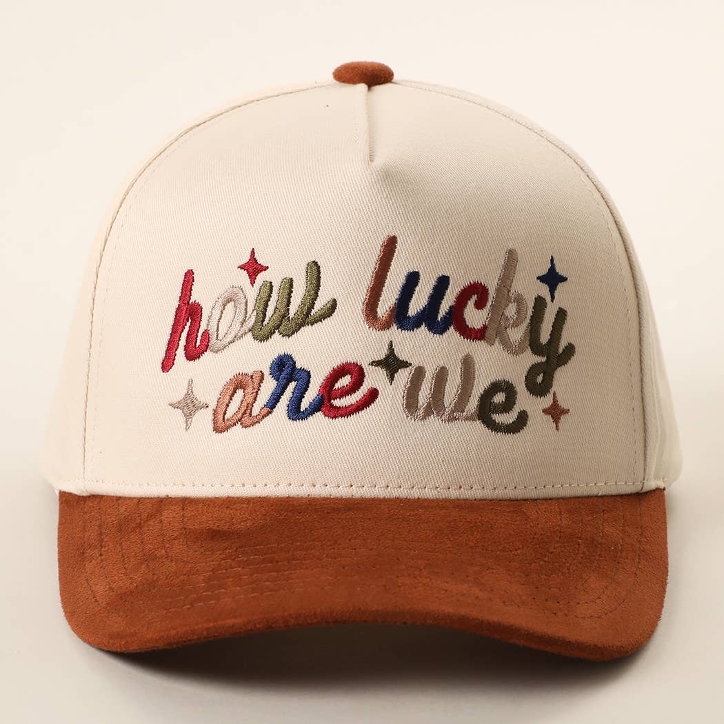 HOW LUCKY ARE WE Two-Tone Suede Brim Trucker Hat