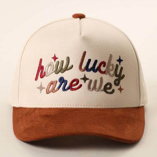 HOW LUCKY ARE WE Two-Tone Suede Brim Trucker Hat